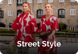 two women in red dresses showing street style photos on launchmetrics spotlight